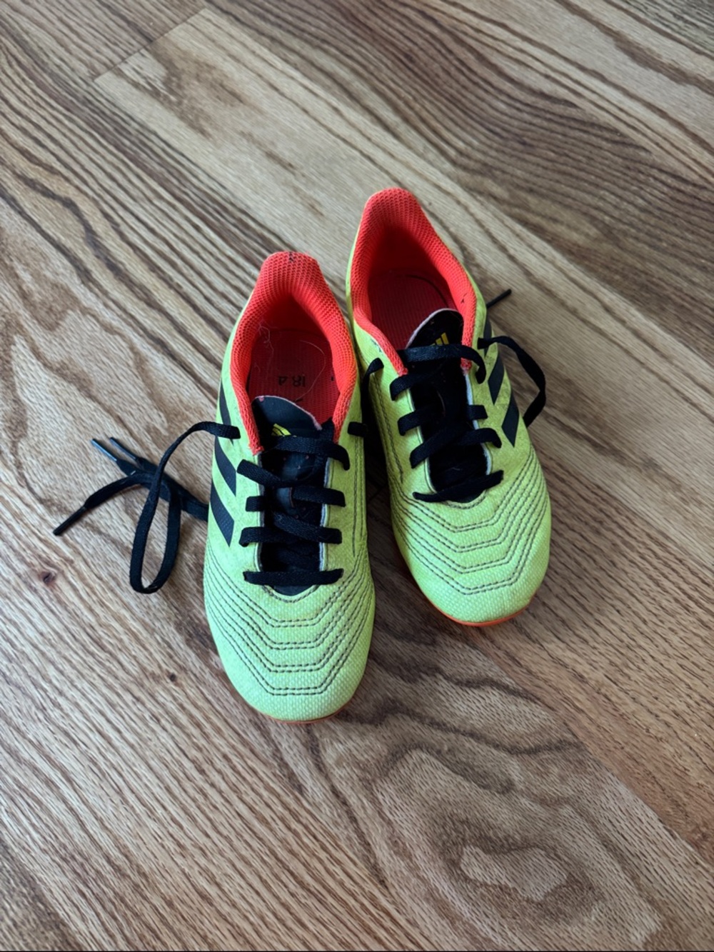 adidas Neon Yellow & Black Kids soccer cleats with Orange Lining